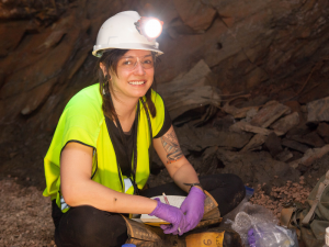 Caitlin Casar, a Ph.D. candidate at Northwestern University, studies microbes living deep beneath the Earth’s surface in the Deep Mine Microbial Observatory, an old gold mine in Lead, South Dakota. (Photo credit: Matthew Kapust/Sanford Underground Research Facility)